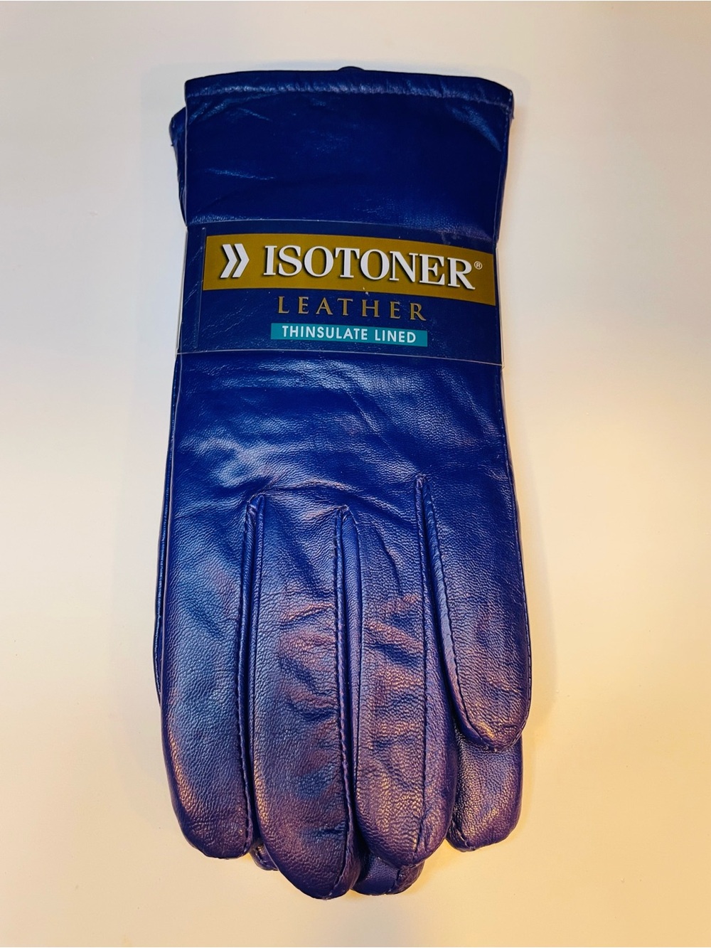 Beautiful Isotoner Thinsulate purple leather gloves. New in packaging